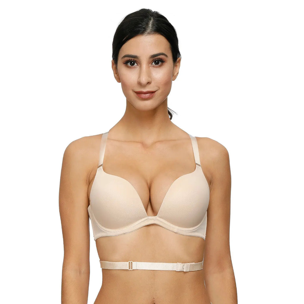 Woman wearing a beige bra on a white background