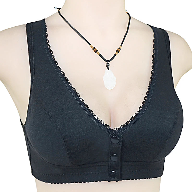 Black wireless bralette with scalloped lace trim and a button-front closure, displayed on a mannequin torso with a necklace.