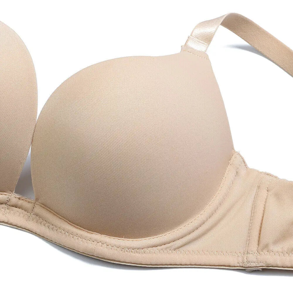 Beige bra on a white background