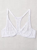White lace bralette on a light gray background