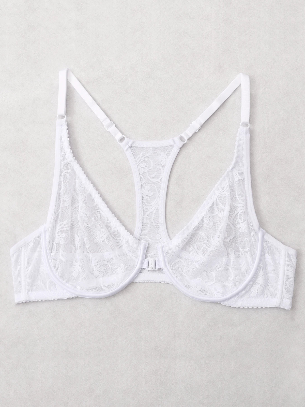 White lace bralette on a light gray background
