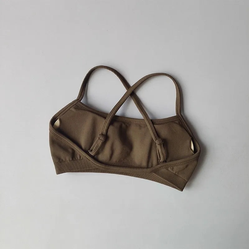 Brown sports bra on a light gray background