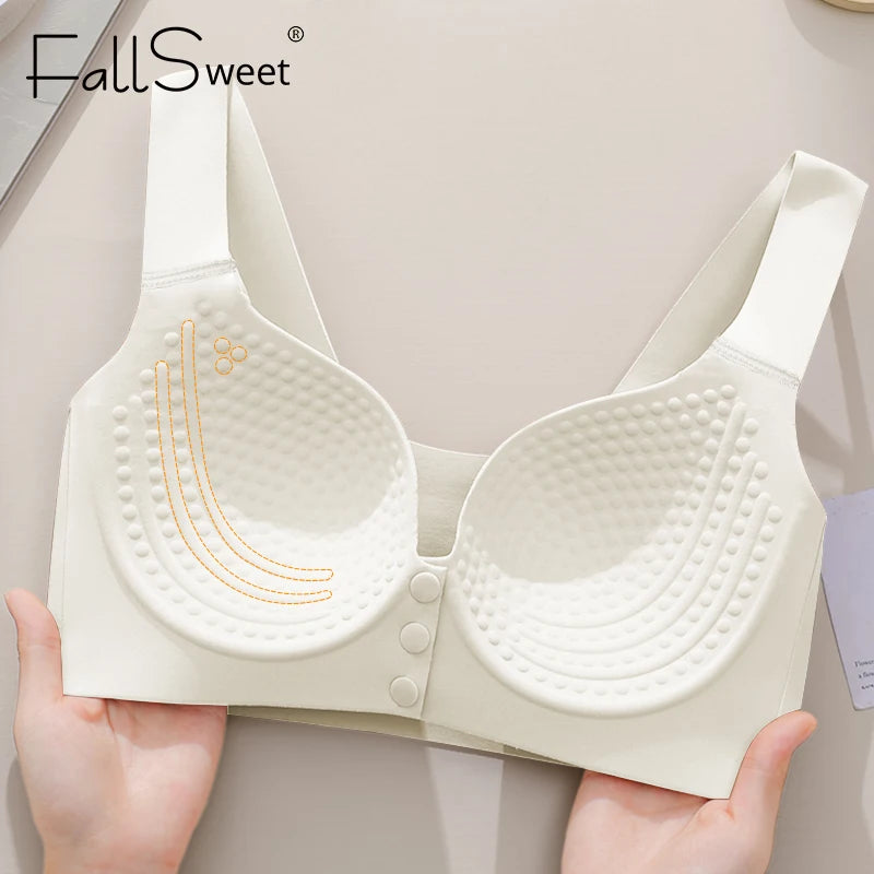 White bra with brand name 'FallSweet' held by a person against a neutral background