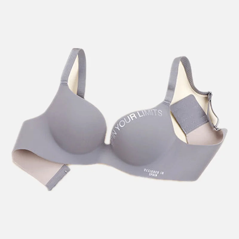 Gray bra with 'Push Through Your Limits' text on a white background