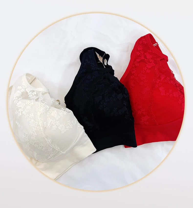 Three lace underwire bras in white, black, and red, arranged side-by-side inside a circular frame on a white fabric background.