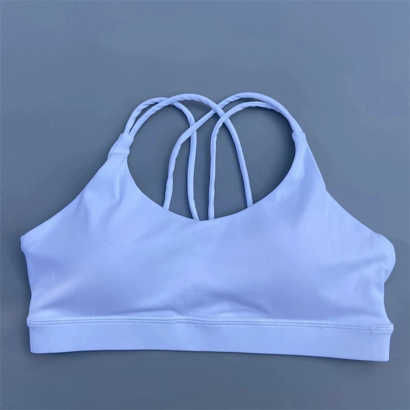 Light blue sports bra on a gray background