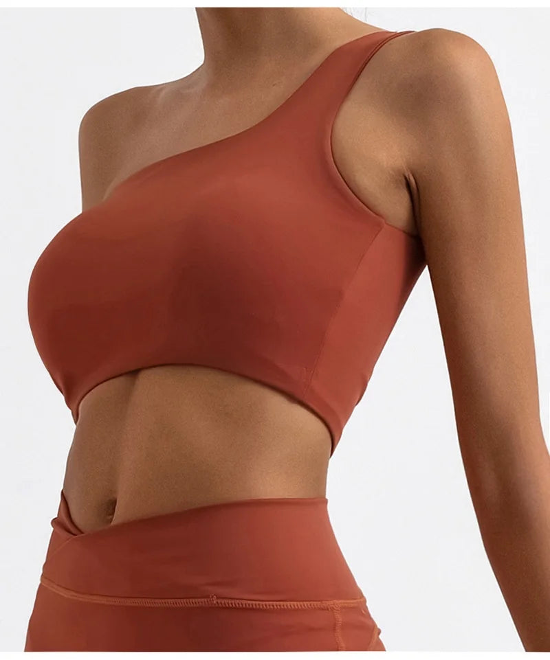 Brown sports bra on a plain background