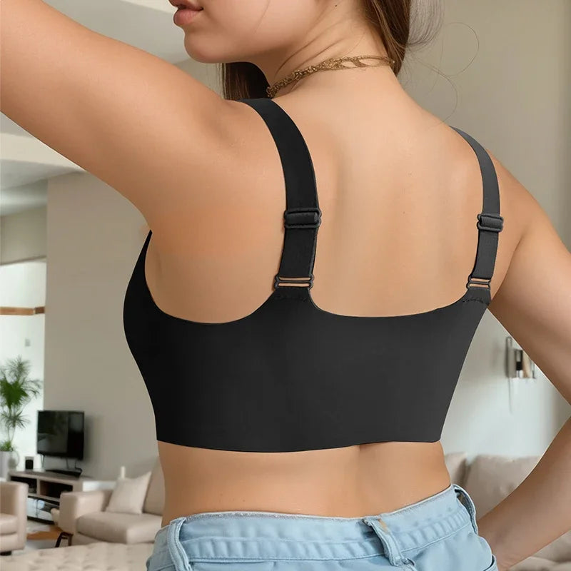 Person wearing a black sports bra in a casual setting