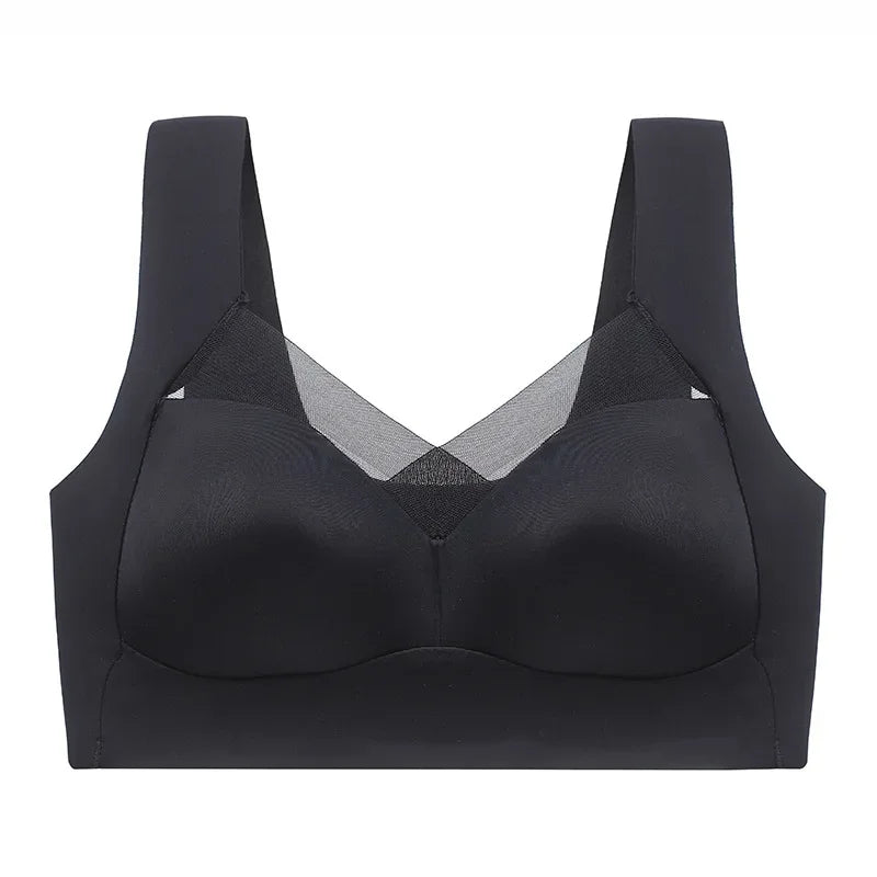 Black bra with mesh panels on a white background