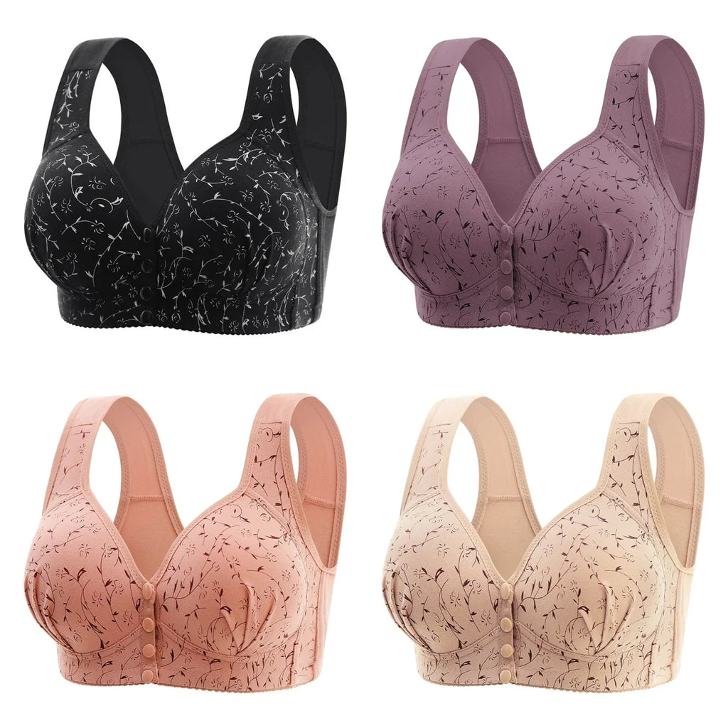 Four wireless underwire bras arranged in a 2x2 grid on a white background, showing different colors and patterns: black with white speckles, dusty purple with black speckles, light peach with black speckles, and light beige with black speckles.