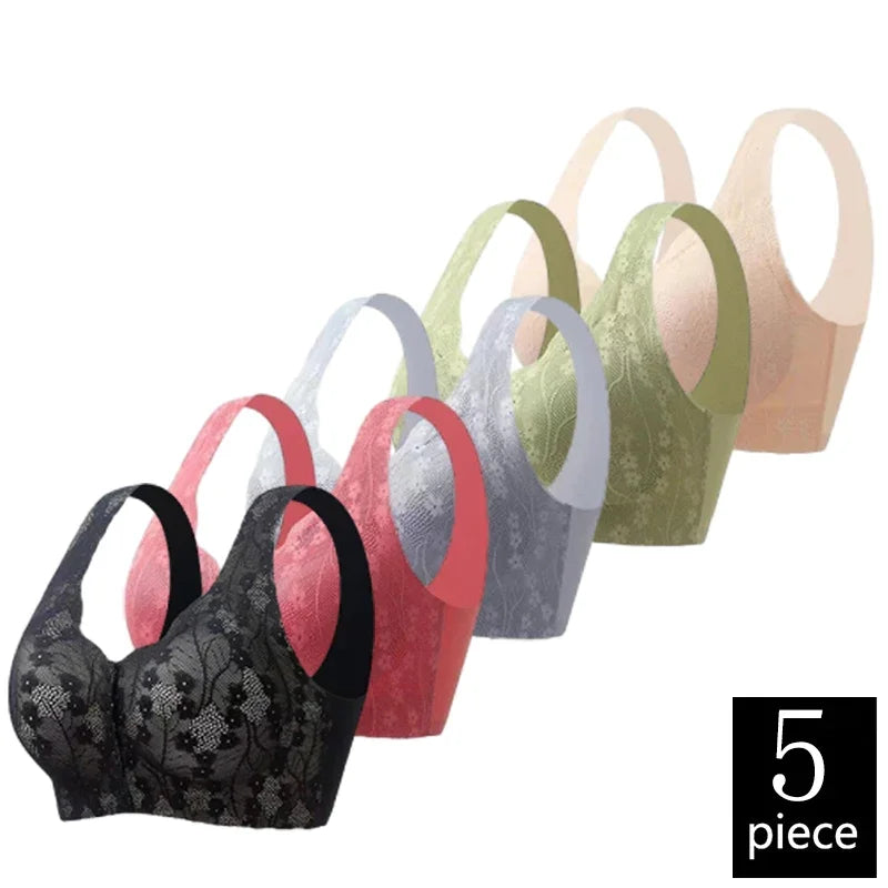 Set of five bras in various colors on a white background