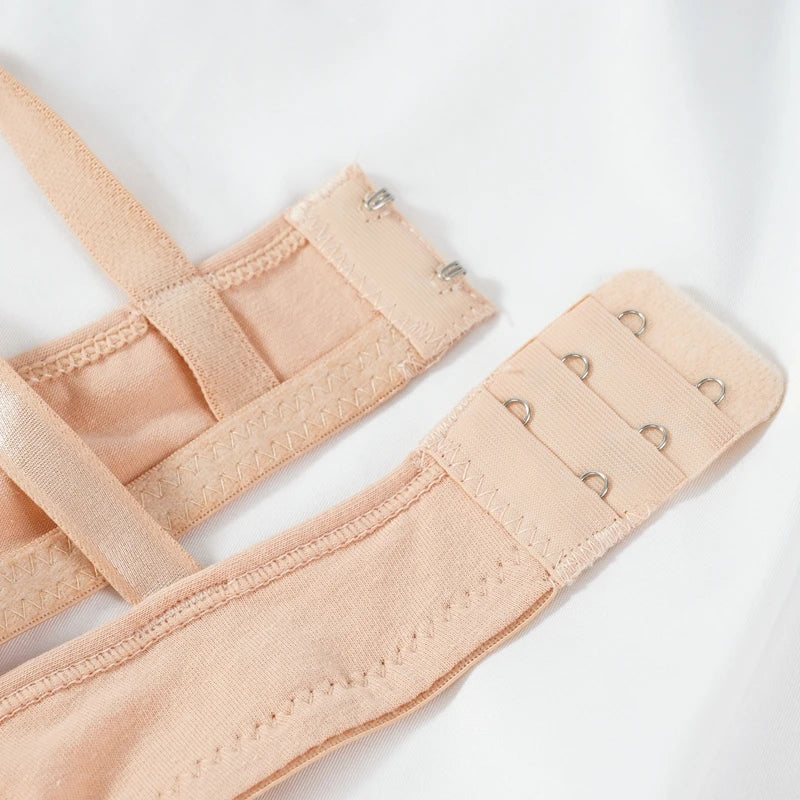 Beige bra strap on a white background