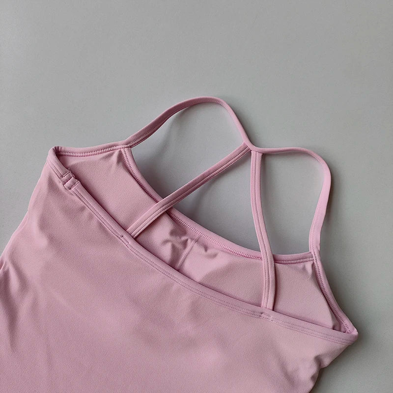 Pink sports bra on a gray background