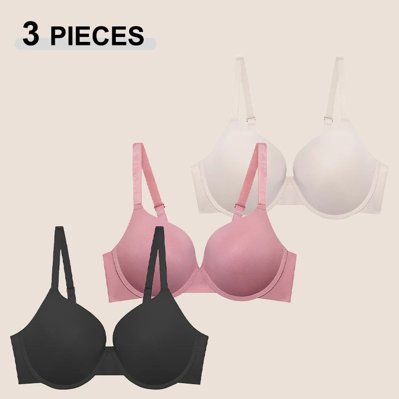 Black and pink bras displayed against a beige background with '3 PIECES' text.