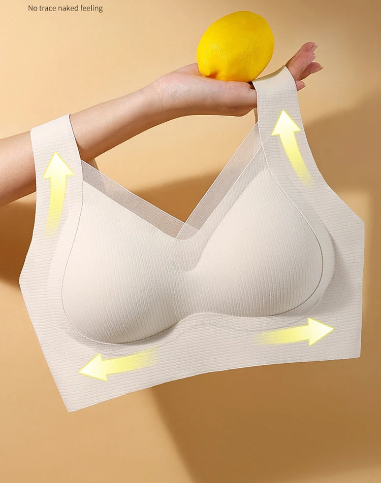 Beige bra with yellow arrows on a beige background