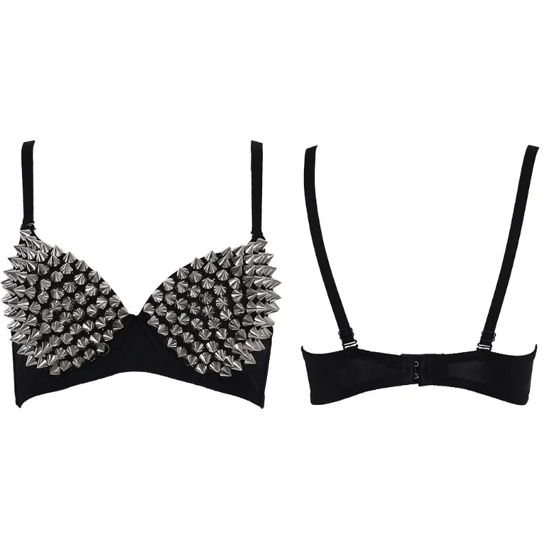 Black bra with silver spikes and black garters on a white background