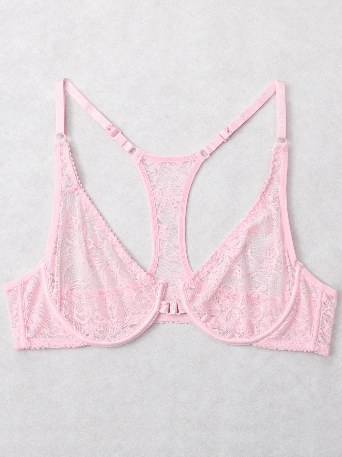 Pink bralette on a light gray background