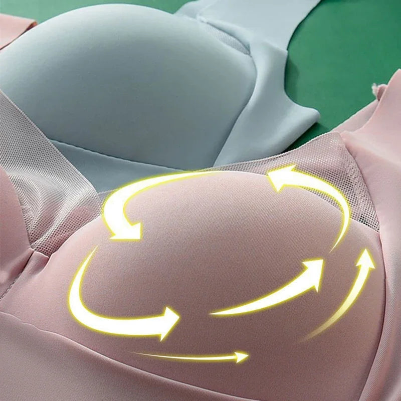 Close-up of a bra with yellow arrows indicating movement, on a green background.