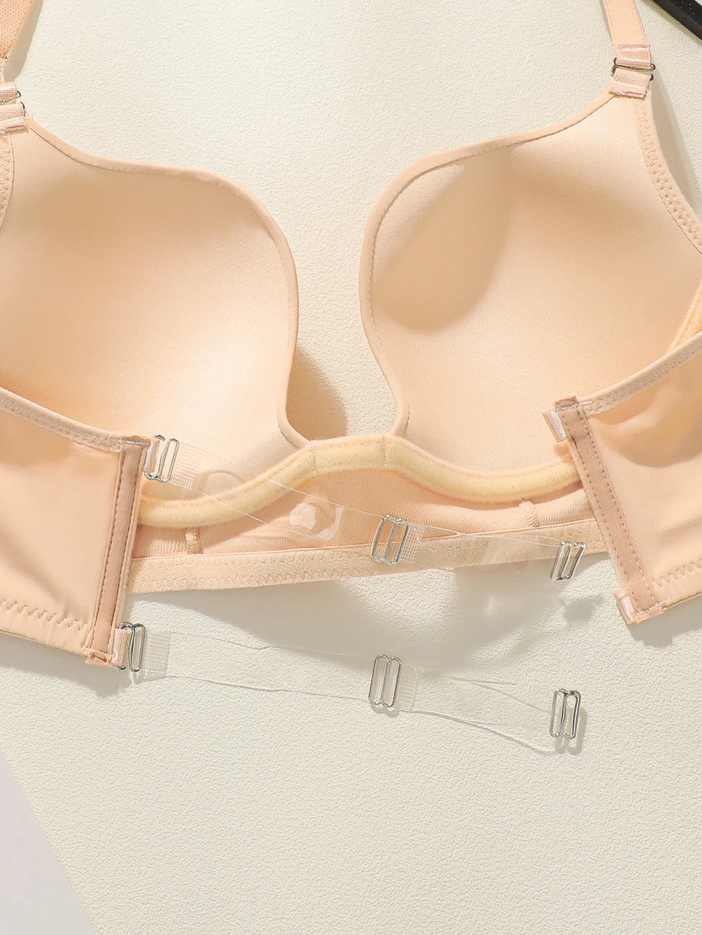 Beige bra on a light gray background