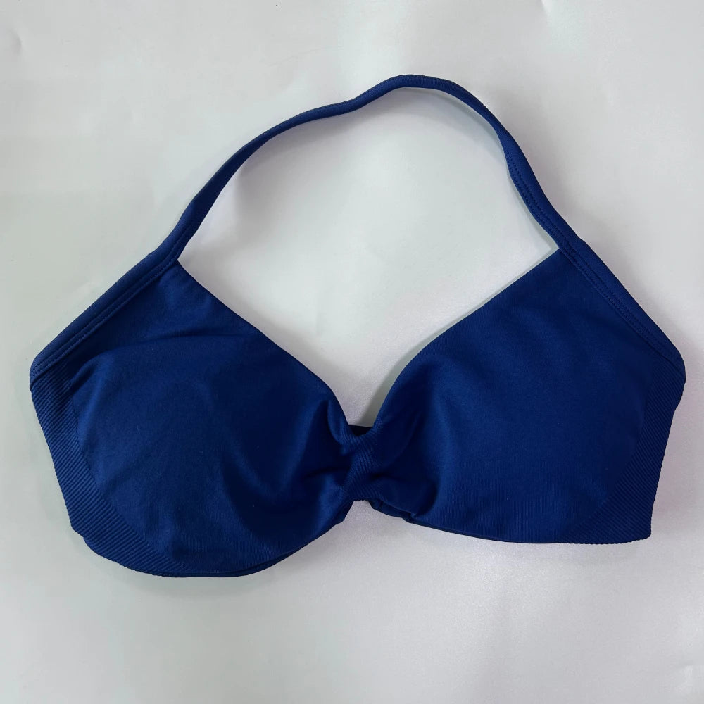 Blue bikini top on a white background
