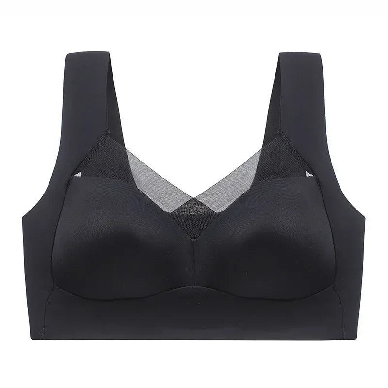Black bra with mesh panels on a white background