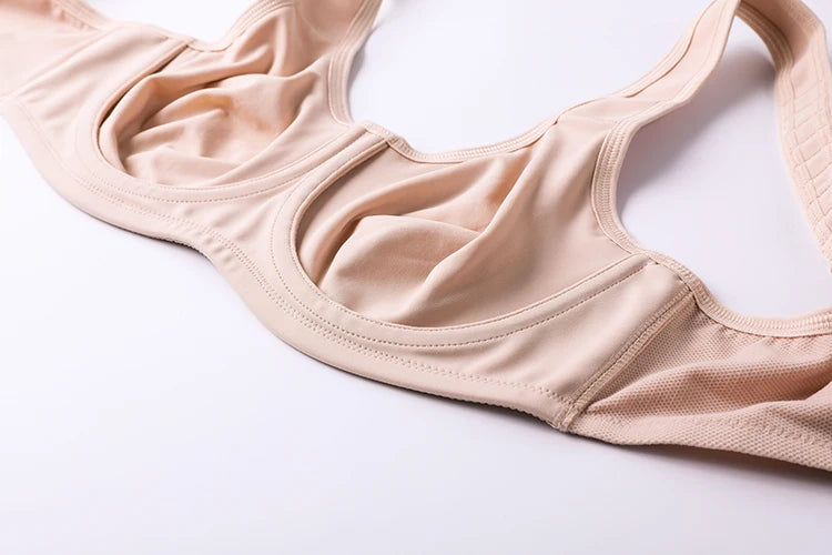 Beige bra on a white background