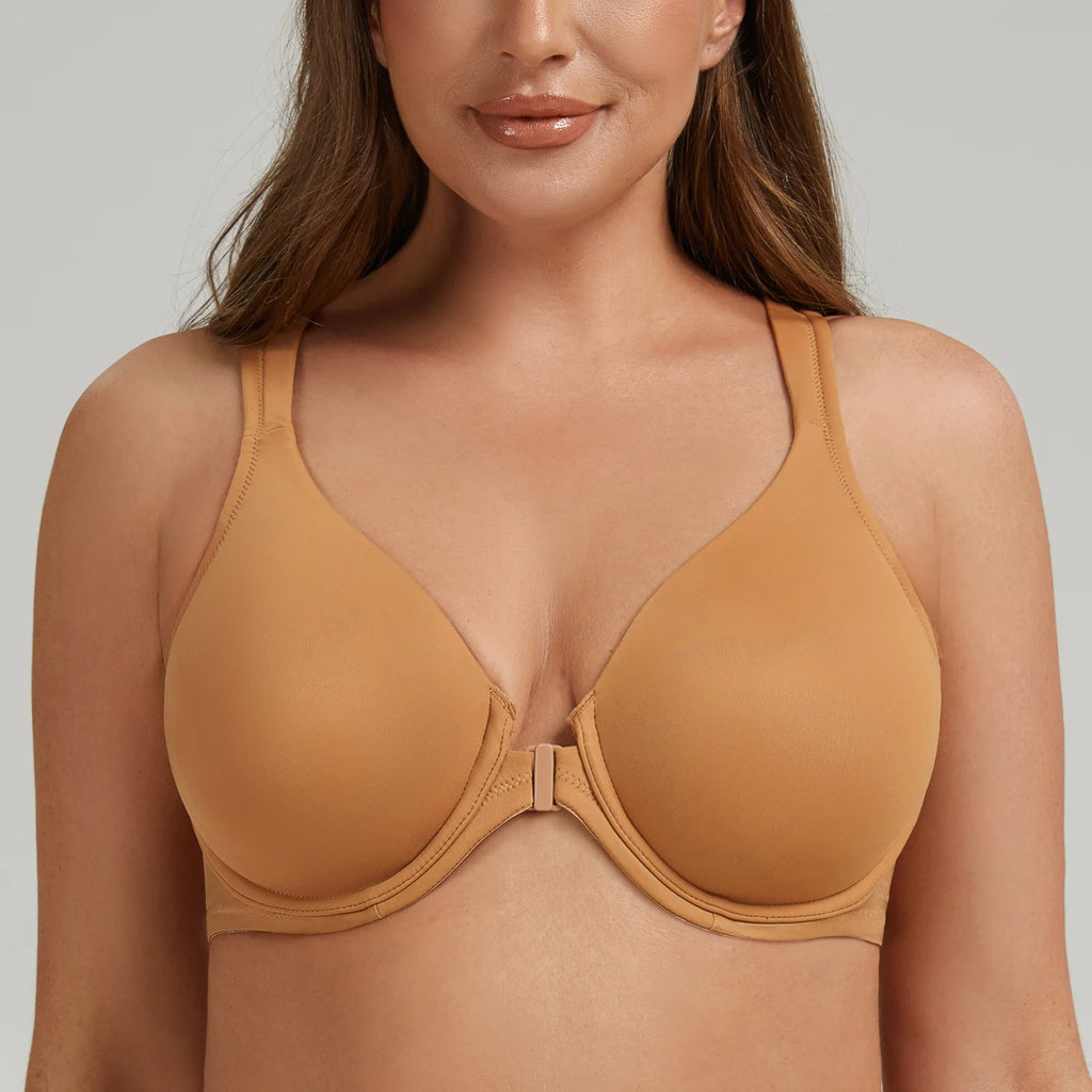 Woman wearing a tan bra against a neutral background