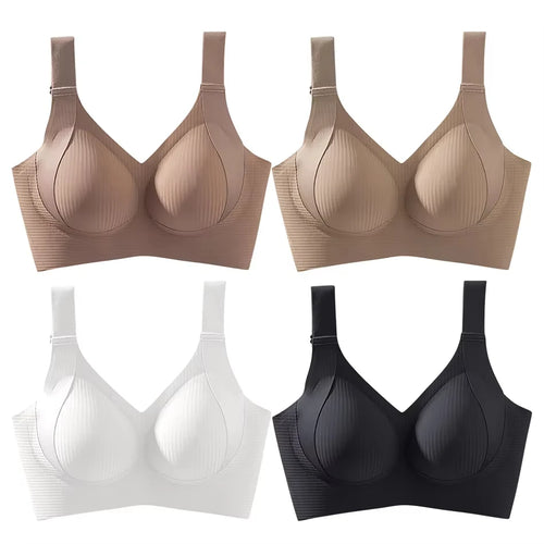 Set of four bras in beige, white, and black on a white background