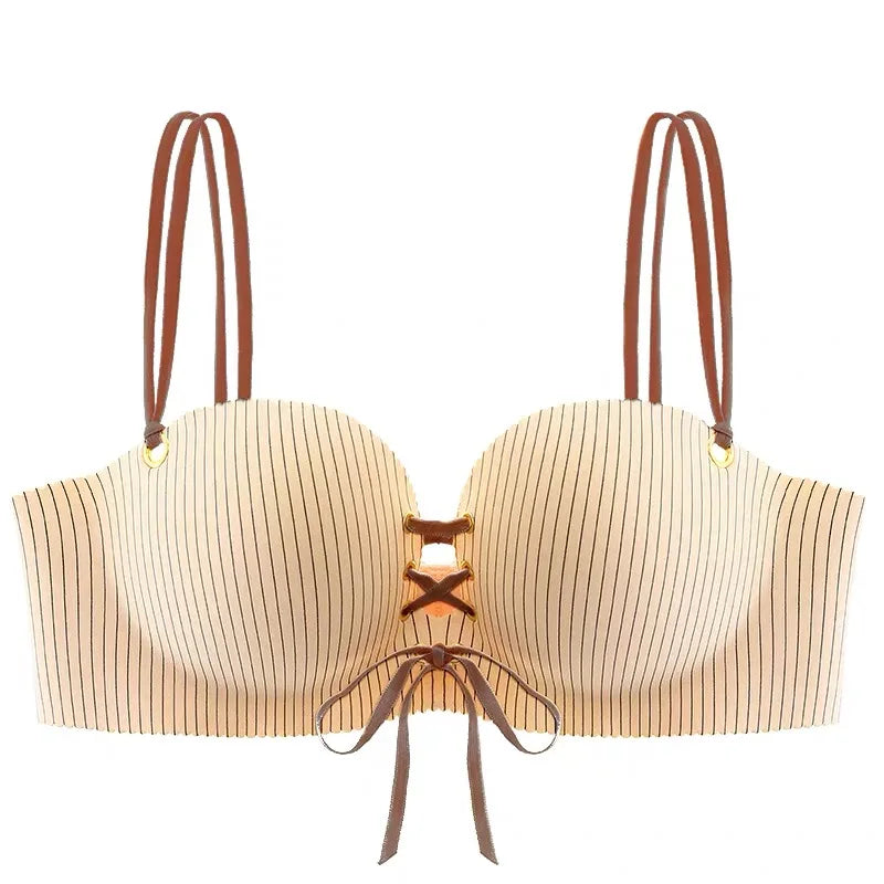 A beige and brown striped underwire bra with brown shoulder straps, a lace-up front detail, and a small bow at the center, shown against a plain white background.