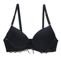 Black bra with lace details on a white background