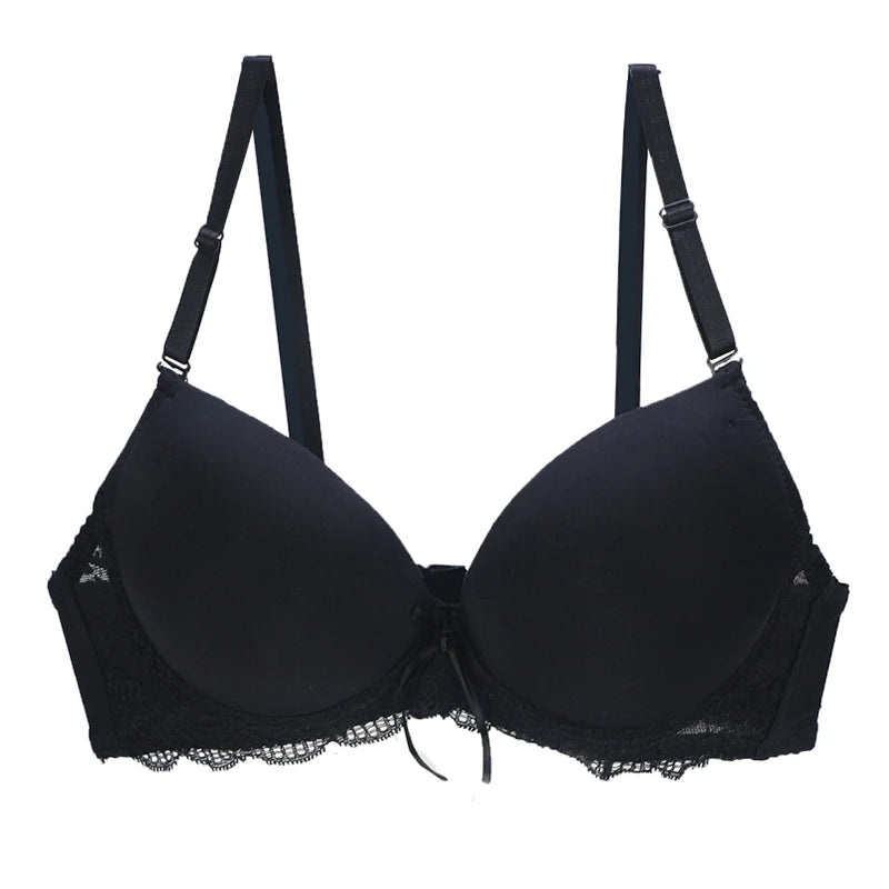 Black bra with lace details on a white background