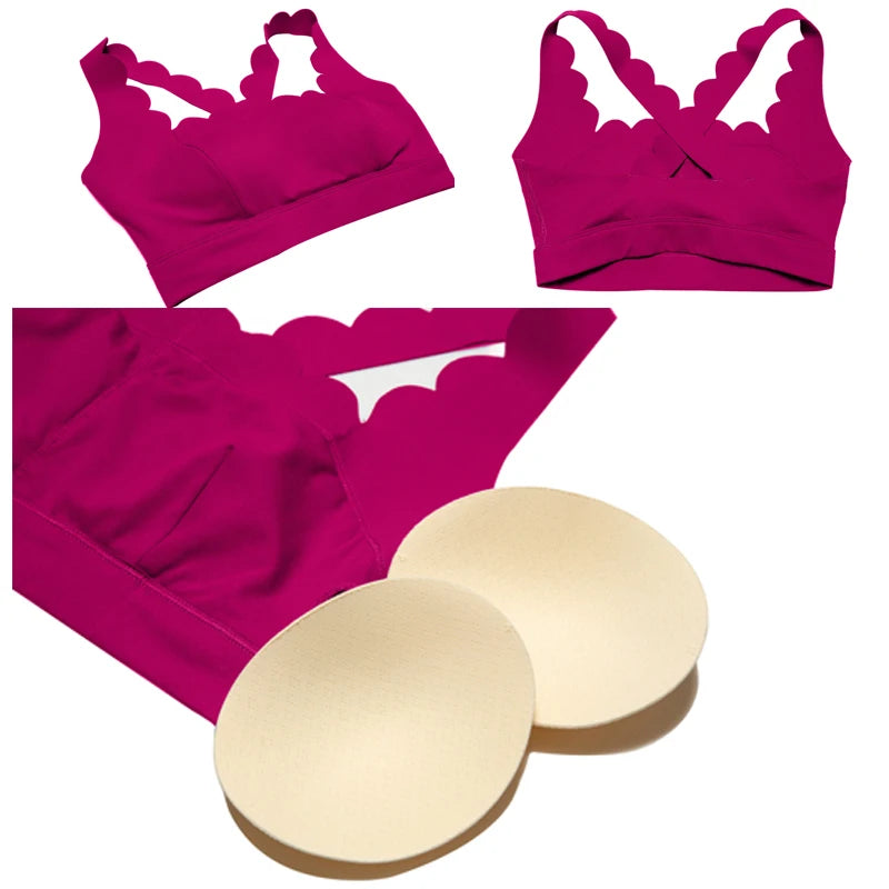 Pink bikini set with scalloped edges and two gold circular pads on a white background