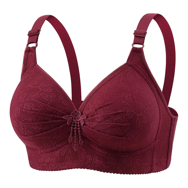 Maroon bra with floral lace details on a white background