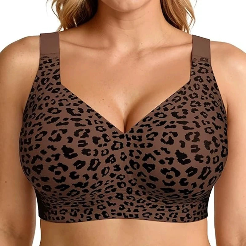 Leopard print sports bra worn by a person on a white background