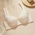 Beige bra on a beige background