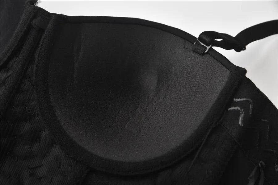 Black bra with straps on a white background