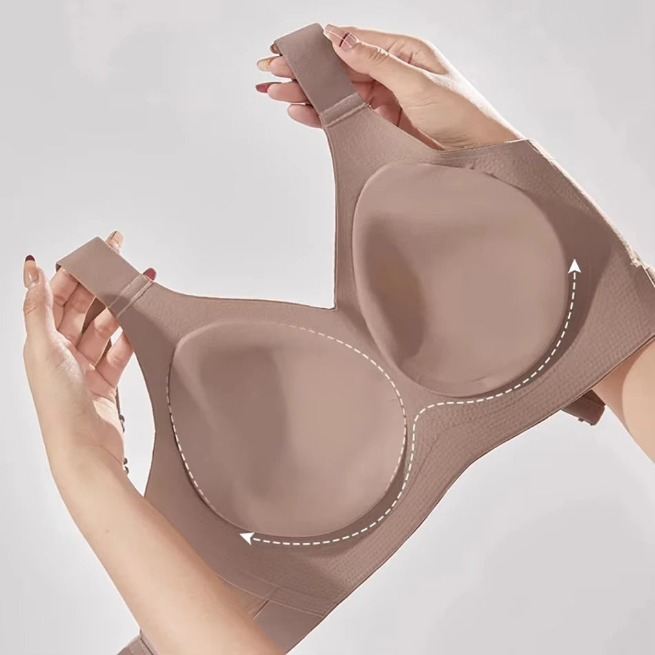 Brown bra being held up against a light gray background