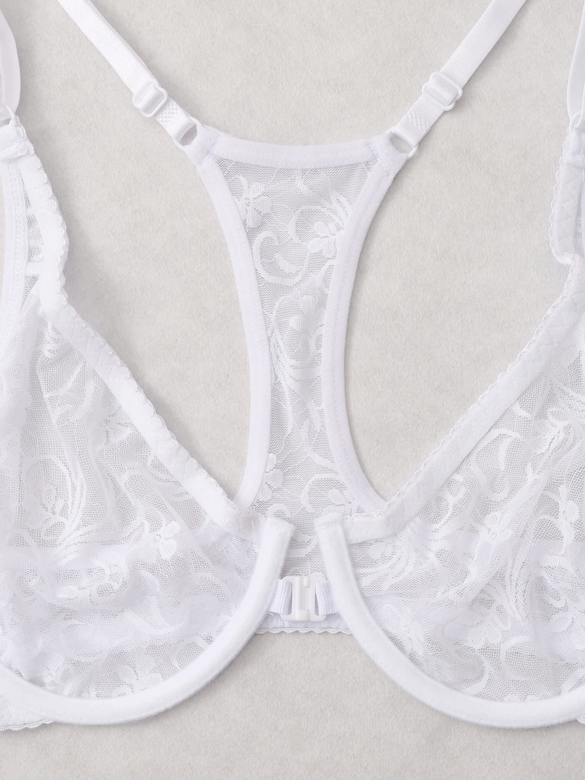 White lace bra on a beige background