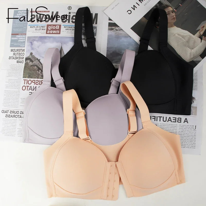 Set of bras in various colors on a newspaper background