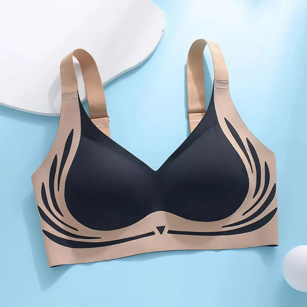 Black and beige bra on a light blue background