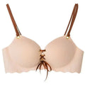 A light beige ribbed underwire bra with brown straps and a lace-up front detail, shown against a plain white background.