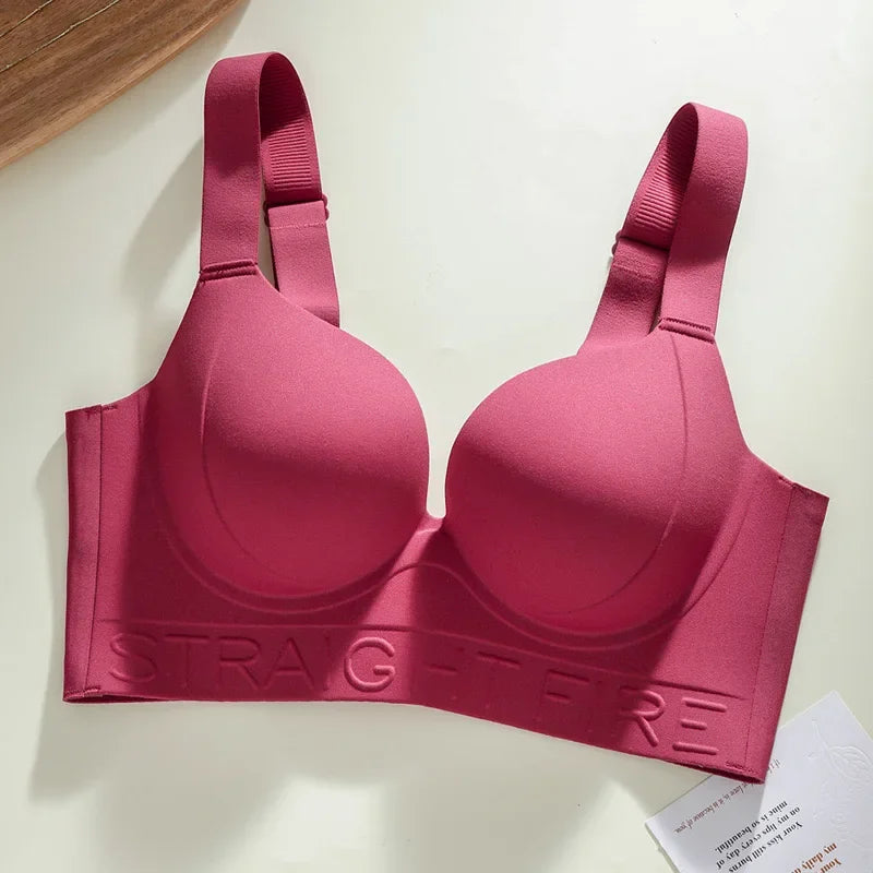 Pink bra with 'SPLASH' branding on a light background