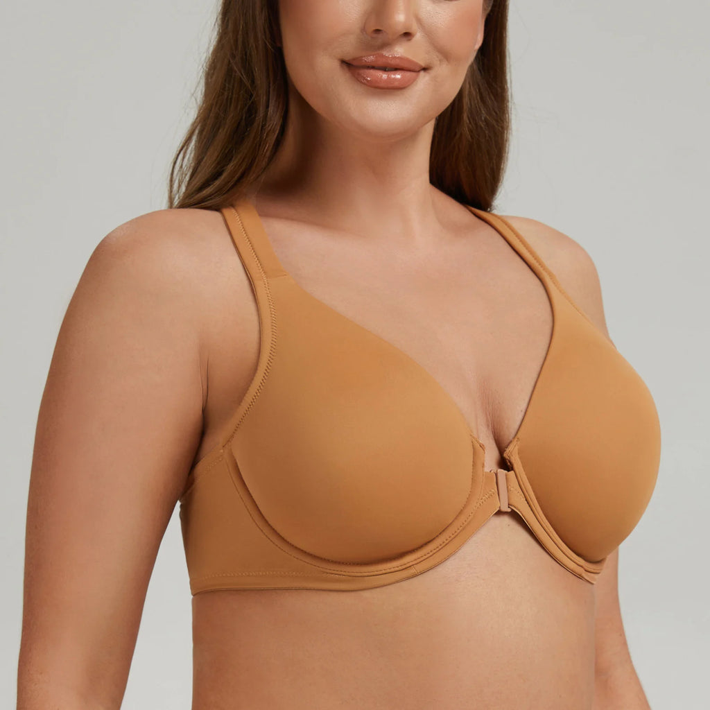 Woman wearing a brown bra against a neutral background