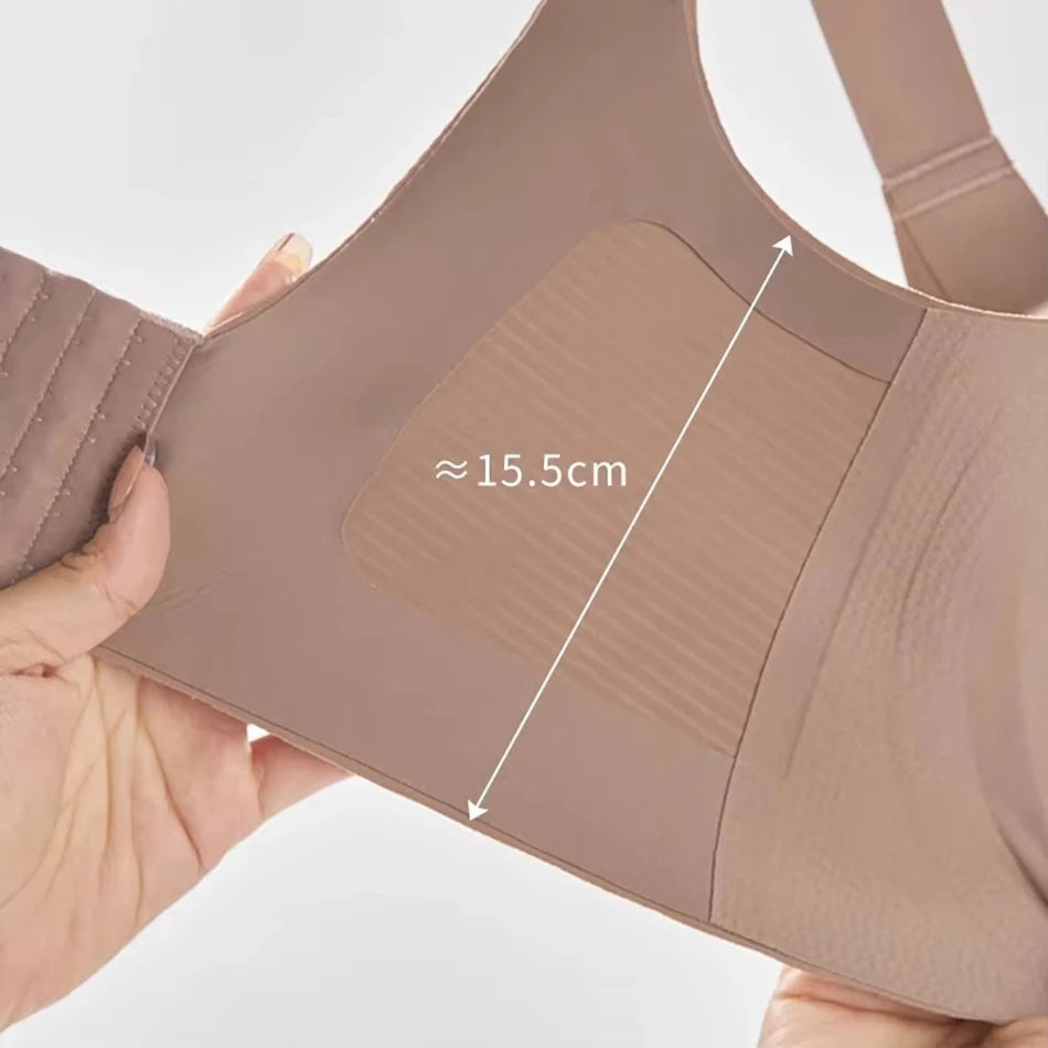 Beige shapewear with measurement label on a white background