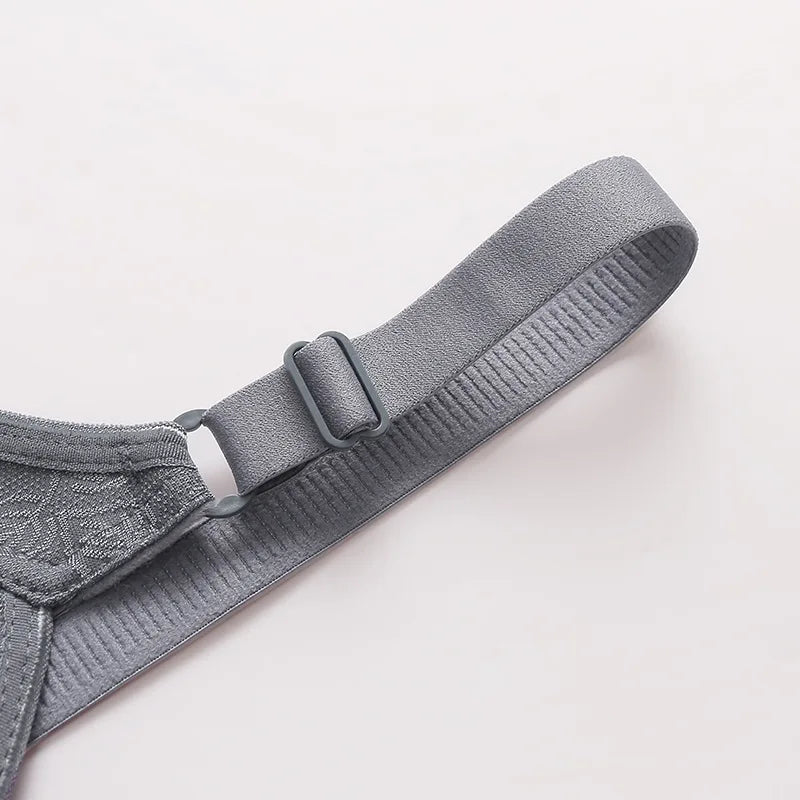 Gray dog harness on a light gray background