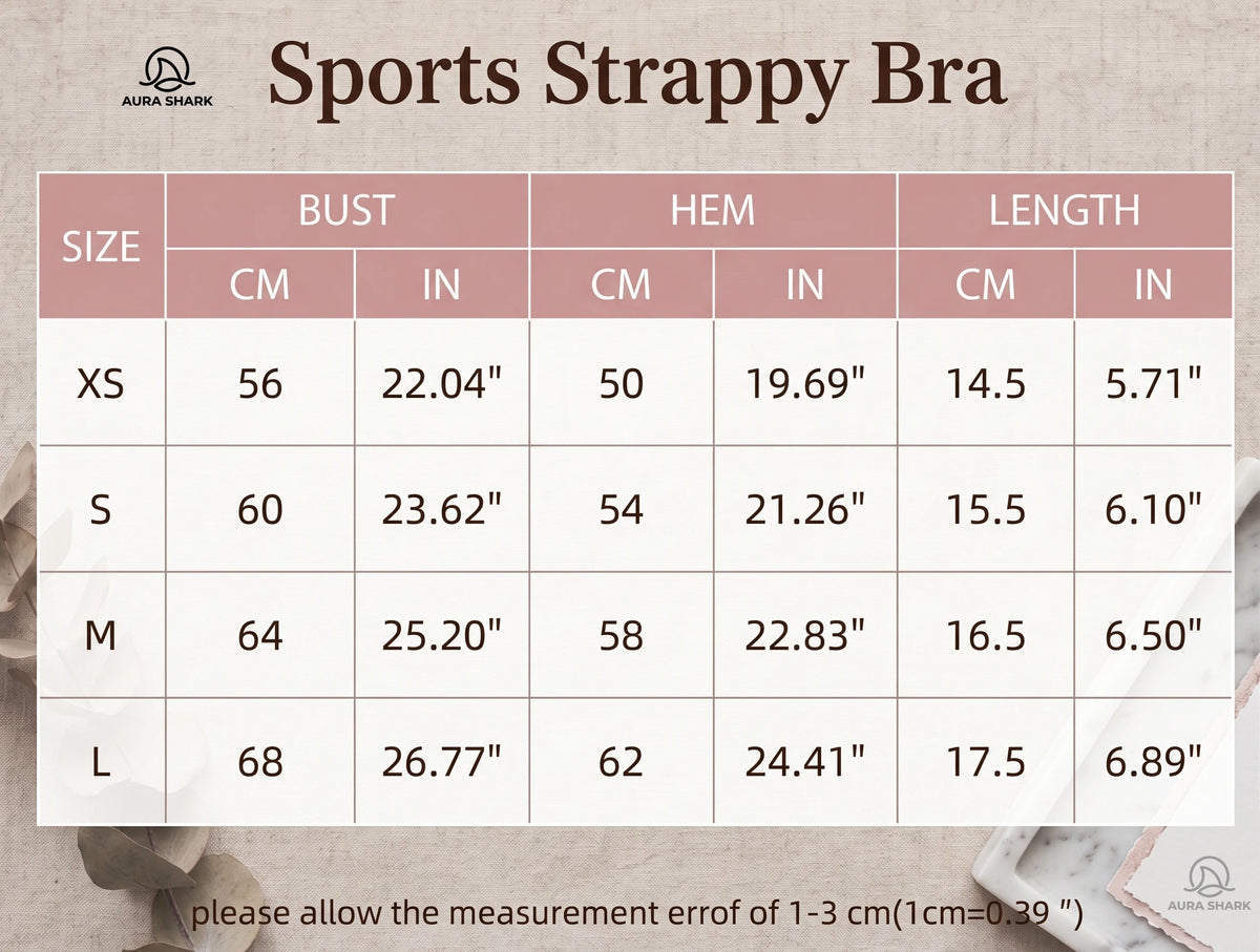 A size measurement chart for an Aura Shark Sports Strappy Bra, displaying a size grid from XS to L with measurements in centimeters and inches for bust, hem, and length, set against a neutral textured background.