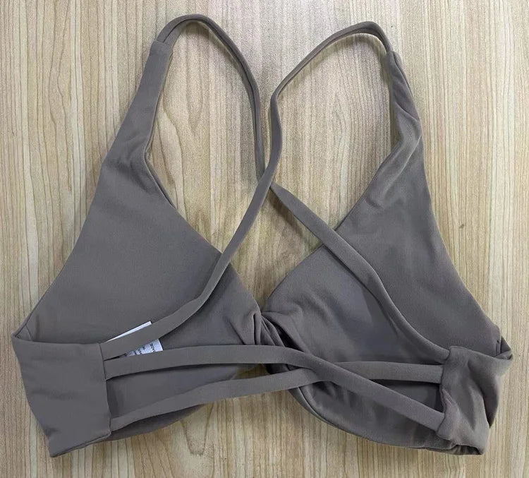 Gray bikini set on a wooden surface