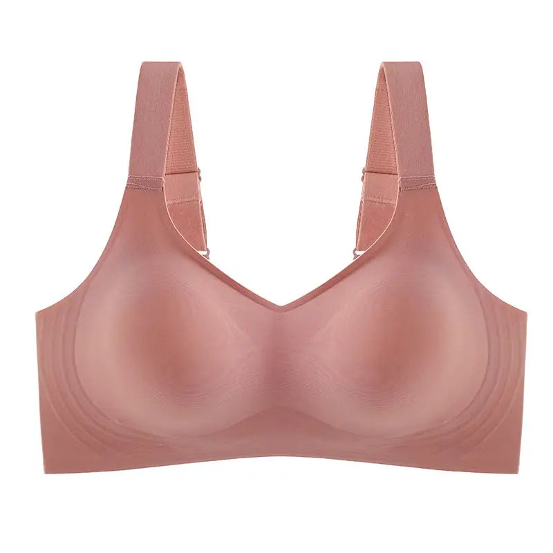 Pink bra on a white background