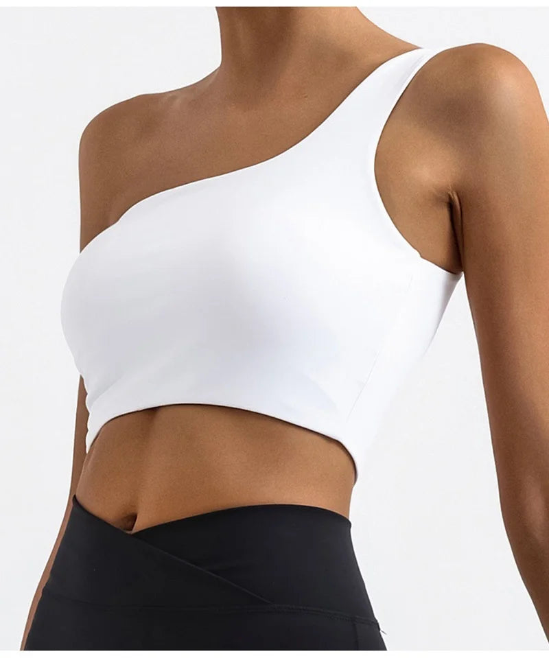 White sports bra worn by a person on a white background