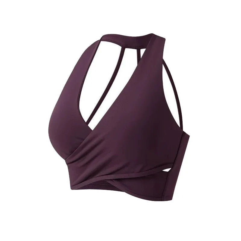 Purple halter top with cut-out design on a white background